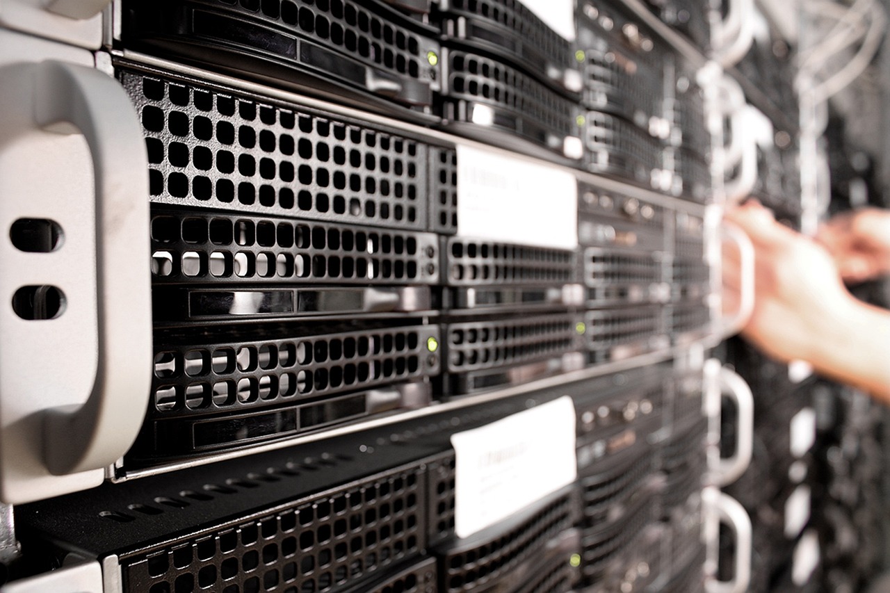 Engineers working in a hands-on network lab environment